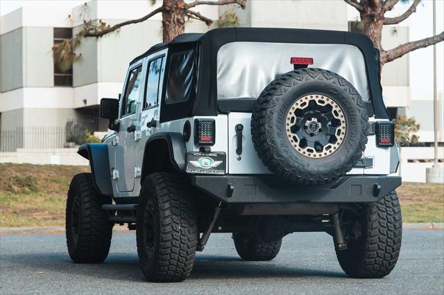 Photo of 2018 Bright White Clearcoat Jeep Wrangler JK Unlimited
