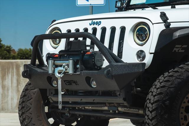 Photo of 2018 Bright White Clearcoat Jeep Wrangler JK Unlimited