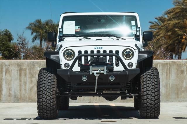 Photo of 2018 Bright White Clearcoat Jeep Wrangler JK Unlimited