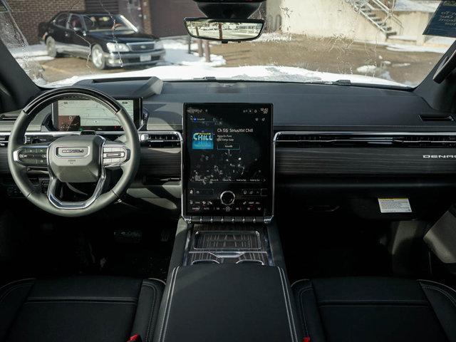 Photo of 2025 Deep Ocean Metallic GMC Sierra EV