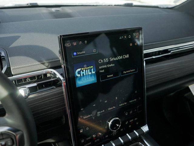 Photo of 2025 Deep Ocean Metallic GMC Sierra EV