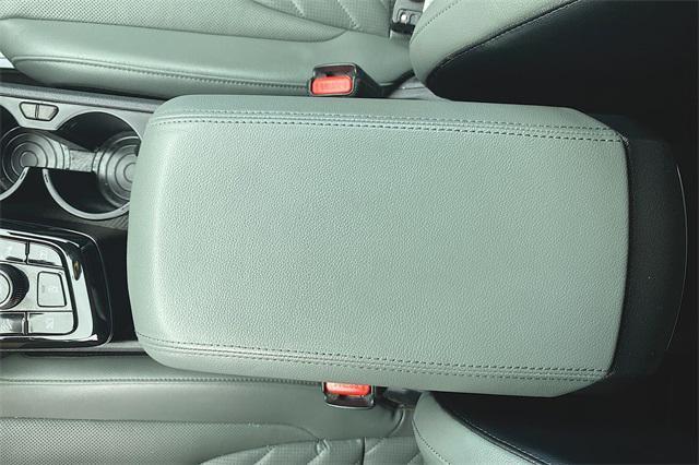 Photo of 2023 Jungle Green/Ebony Black Roof Kia Sportage