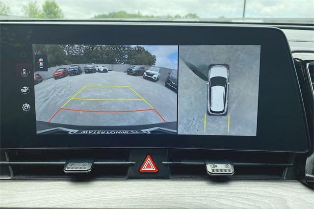 Photo of 2023 Jungle Green/Ebony Black Roof Kia Sportage