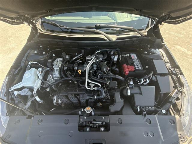 Photo of 2024 Super Black Clearcoat Nissan Altima