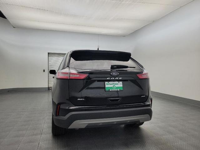 Photo of 2024 Agate Black Metallic Ford Edge