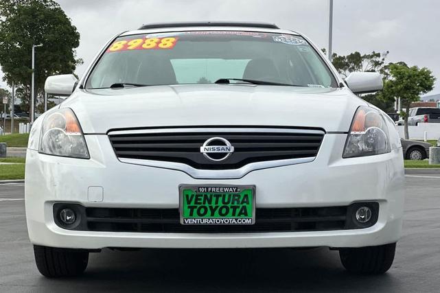 Photo of 2009 Winter Frost Pearl Nissan Altima