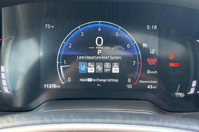 Photo of 2024 Celestite/Midnight Black Metallic Toyota Corolla