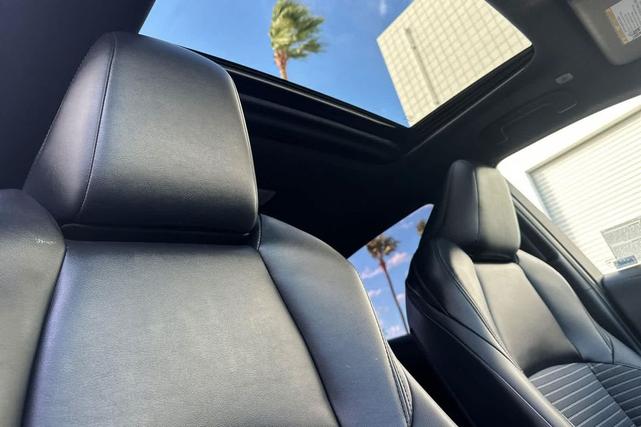Photo of 2024 Celestite/Midnight Black Metallic Toyota Corolla