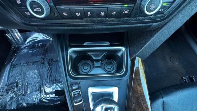 Photo of 2015 White BMW 320