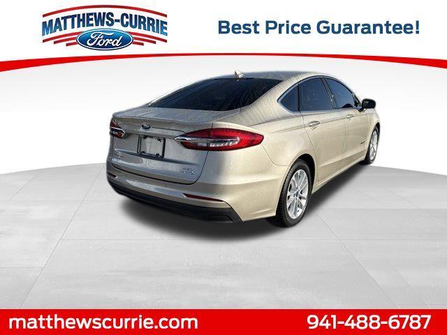 Photo of 2019 White Gold Ford Fusion Hybrid