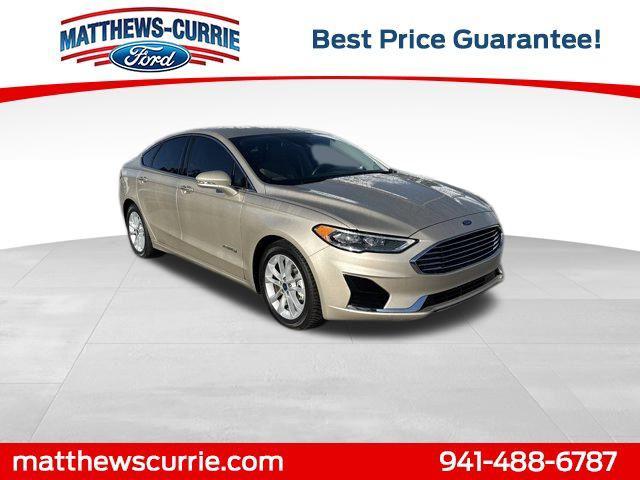 Photo of 2019 White Gold Ford Fusion Hybrid