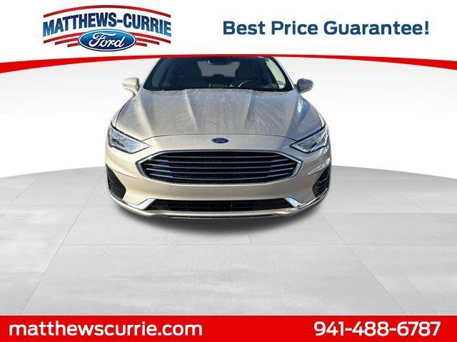 Photo of 2019 White Gold Ford Fusion Hybrid