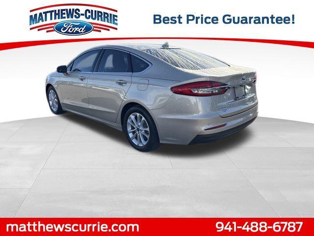 Photo of 2019 White Gold Ford Fusion Hybrid