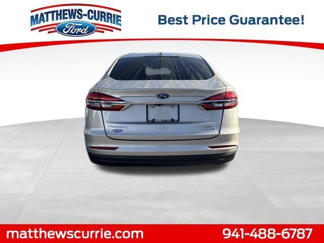 Photo of 2019 White Gold Ford Fusion Hybrid
