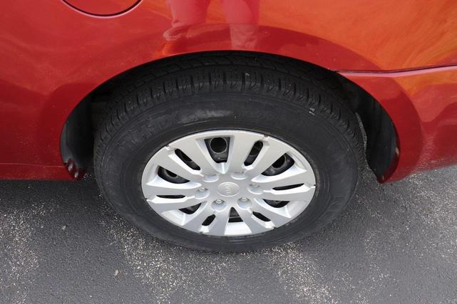 Photo of 2011 Claret Red Kia Sedona