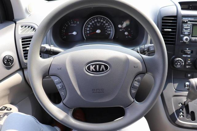 Photo of 2011 Claret Red Kia Sedona