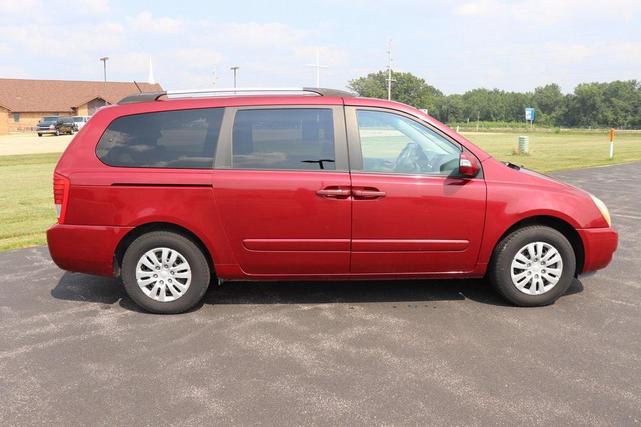 Photo of 2011 Claret Red Kia Sedona