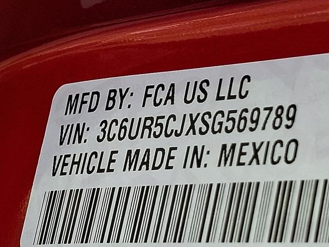 Photo of 2025 Molten Red Pearlcoat RAM 2500