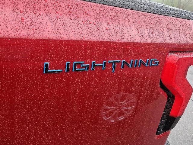 Photo of 2025 Rapid Red Metallic Tinted Clearcoat Ford F-150 Lightning
