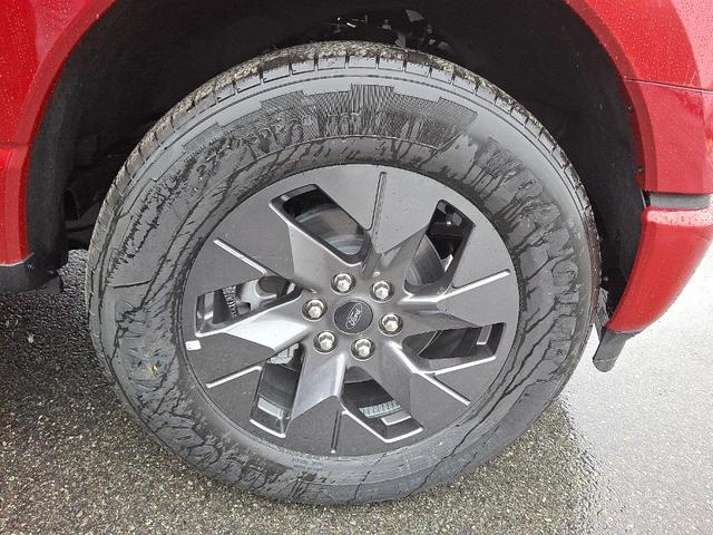 Photo of 2025 Rapid Red Metallic Tinted Clearcoat Ford F-150 Lightning