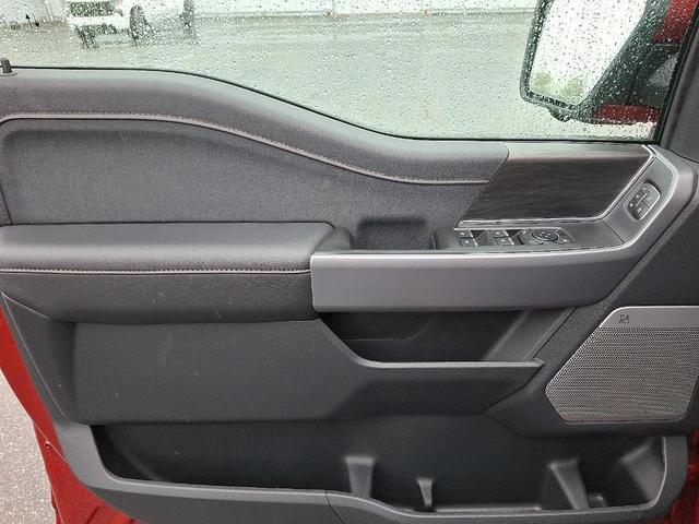 Photo of 2025 Rapid Red Metallic Tinted Clearcoat Ford F-150 Lightning