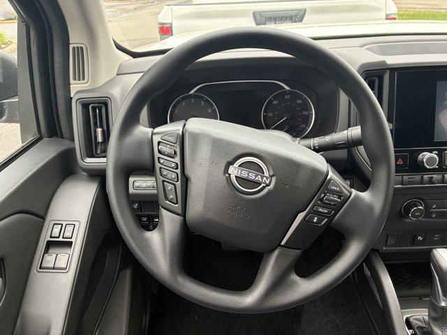 Photo of 2025 Glacier White Nissan Frontier