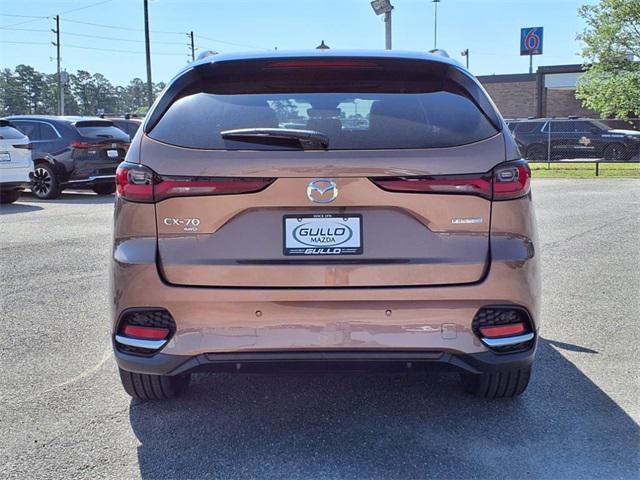 Photo of 2025 Melting Copper Metallic Mazda CX-70 PHEV