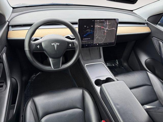 Photo of 2021 Deep Blue Metallic Tesla Model Y