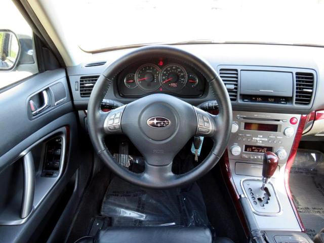 Photo of 2009 Diamond Gray / Quartz Silver Metallic Subaru Outback