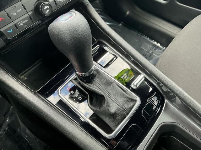 Photo of 2023 Granite Crystal Metallic Clearcoat Jeep Compass