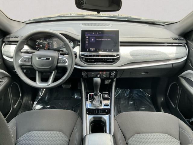 Photo of 2023 Granite Crystal Metallic Clearcoat Jeep Compass