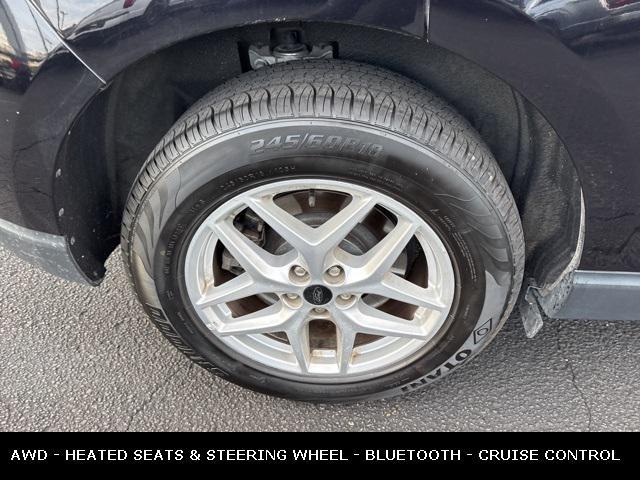 Photo of 2023 Agate Black Metallic Ford Edge