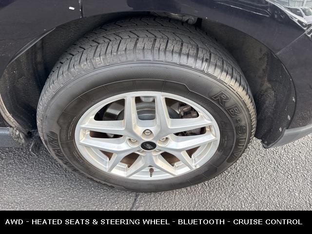 Photo of 2023 Agate Black Metallic Ford Edge