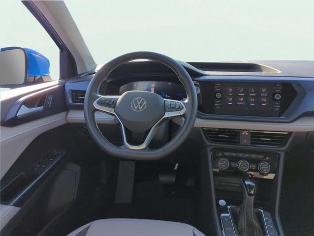 Photo of 2024 Cornflower Blue Volkswagen Taos