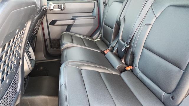 Photo of 2025 Ruby Red Metallic Tinted Clearcoat Ford Bronco