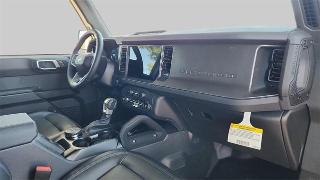 Photo of 2025 Ruby Red Metallic Tinted Clearcoat Ford Bronco
