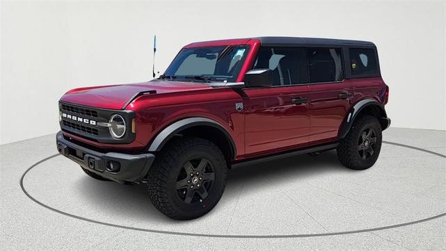 Photo of 2025 Ruby Red Metallic Tinted Clearcoat Ford Bronco