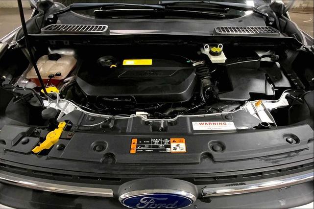 Photo of 2015 Ingot Silver Ford Escape