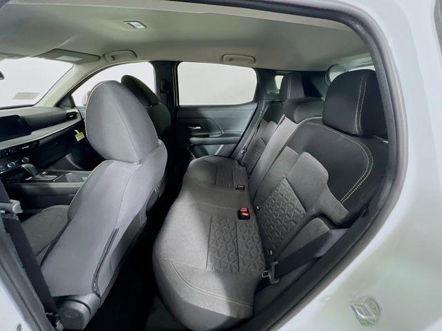 Photo of 2025 Aspen White Tricoat Nissan Kicks