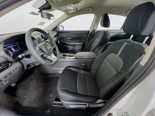 Photo of 2025 Aspen White Tricoat Nissan Sentra