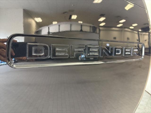 Photo of 2024 Santorini Black Metallic Land Rover Defender