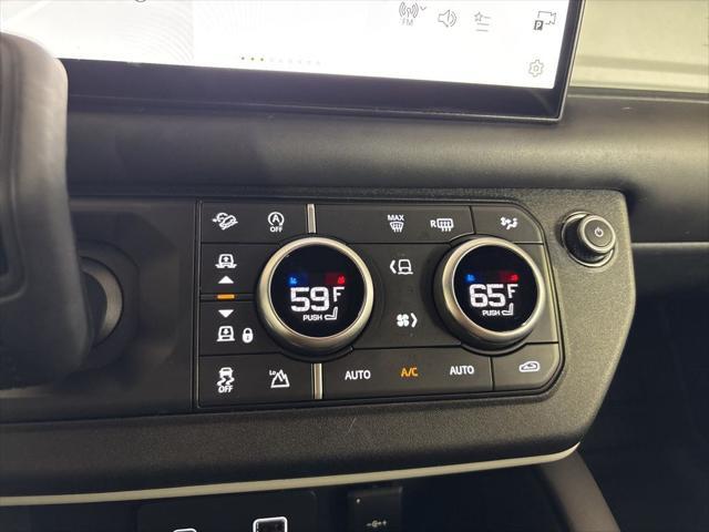 Photo of 2024 Santorini Black Metallic Land Rover Defender