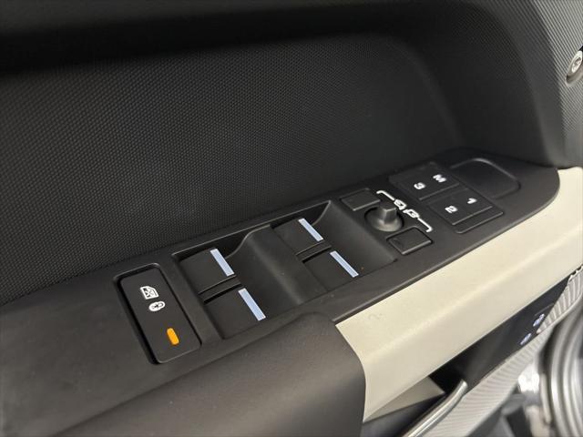 Photo of 2024 Santorini Black Metallic Land Rover Defender