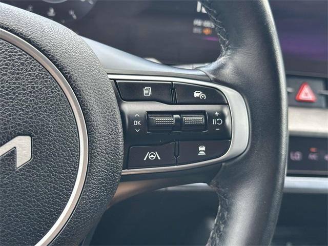 Photo of 2023 Glacier White Pearl Kia Sportage