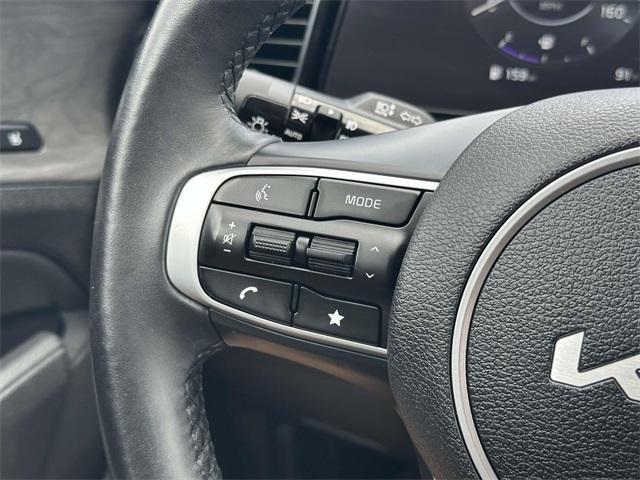 Photo of 2023 Glacier White Pearl Kia Sportage