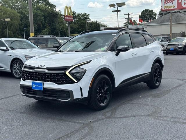 Photo of 2023 Glacier White Pearl Kia Sportage
