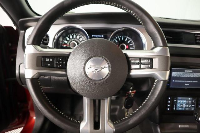 Photo of 2014 Ruby Red Metallic Tinted Clearcoat Ford Mustang
