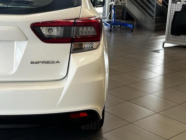 Photo of 2023 Crystal White Pearl Subaru Impreza