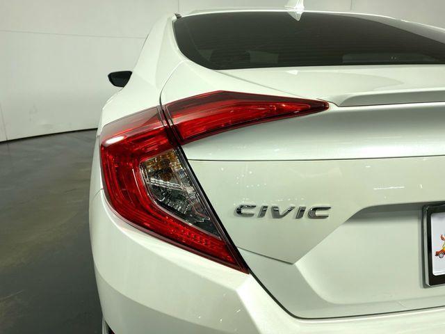 Photo of 2021 Platinum White Pearl Honda Civic