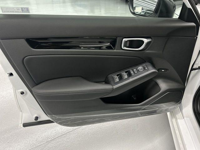 Photo of 2026 Platinum White Pearl Honda Civic Hybrid